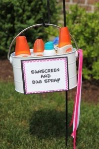 A sunscreen and bug spray station