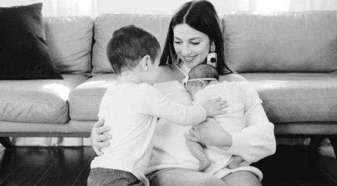 Jacqui with her toddler and infant (Language Stimulation Techniques For a Mama Overcoming PPD Jacqueline Jebian Garcia Contributor Miami Mom Collective)