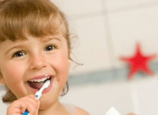 A little girl brushing her teeth (Dr. Bob Unflavored Toothpaste: Sustainable, Fluoridated Cavity Prevention Lynda Lantz Contributor Miami Mom Collective)