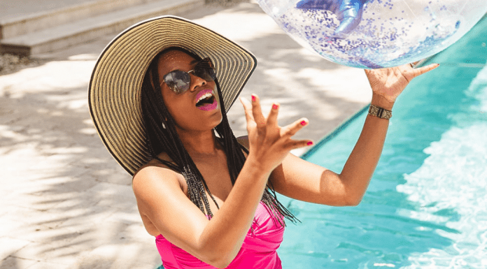 Sharonda enjoying the pool (Swimsuits for Moms: This Season's Top 5 Sharonda Stewart Contributor Miami Mom Collective)