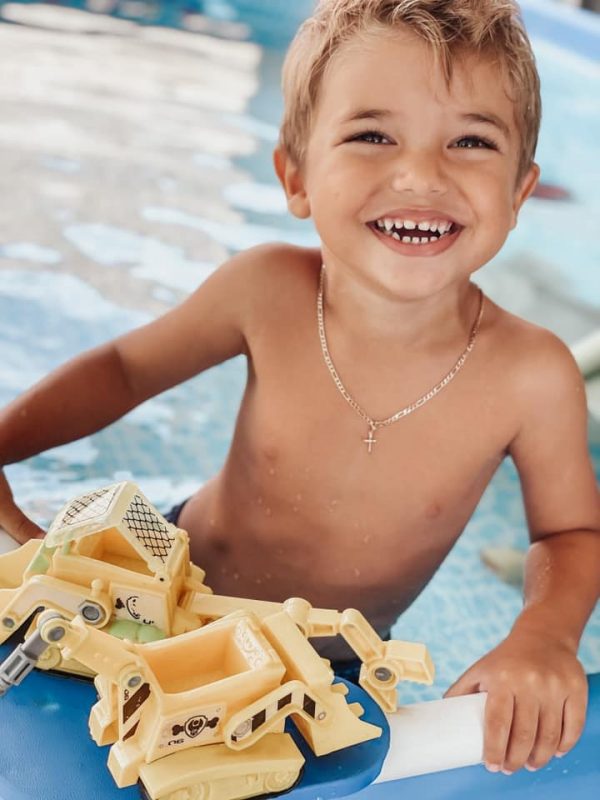 Dianna's son playing with some toys at the pool (Positive Affirmations for Toddlers and Preschool Children&nbsp;Dianna Hill Contributor Miami Mom Collective)