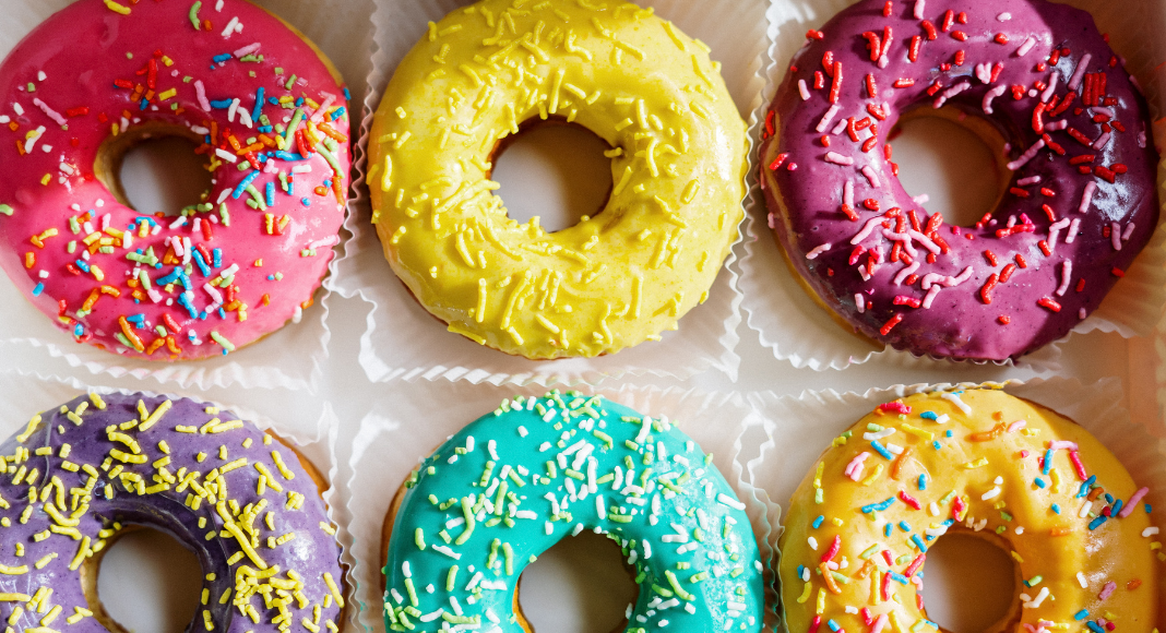A box of donuts with sprinkles (National Donut Day: Make it A-Glaze-ing! Ana-Sofia DuLaney Contributor Miami Mom Collective)