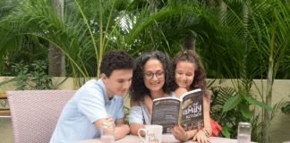 Parenting: The Ups, Downs, and All the Way Arounds Adita reading with her kids (Parenting: The Ups, Downs, and All the Way Arounds Adita Lang Contributor Miami Mom Collective)
