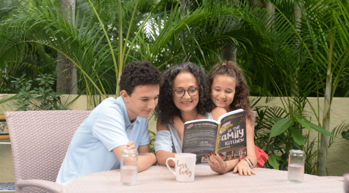 Parenting: The Ups, Downs, and All the Way Arounds Adita reading with her kids (Parenting: The Ups, Downs, and All the Way Arounds Adita Lang Contributor Miami Mom Collective)