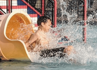 Going down a water slide (Summer Is Almost Here! Are You Ready? | Dr. Bob Pediatric Dentist Lynda Lantz Contributor Miami Mom Collective)