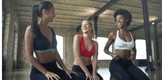 Three women working out (National Women's Health Week & Why It's Important for Moms Zoe Costa Contributor Miami Mom Collective)