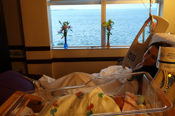 Image: Mother with baby in hospital after delivery (Hospital Bag: Getting Ready for Baby Jessica Alvarez-Ducos Contributor Miami Mom Collective)