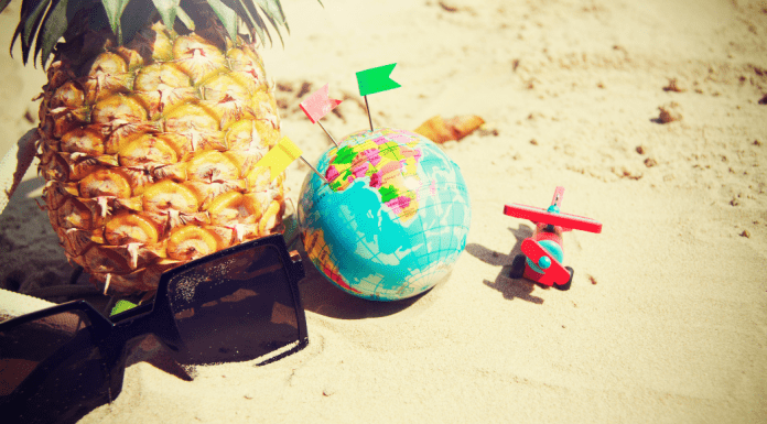 Sunglasses, a pineapple, a toy airplane, and a globe (Fighting Summer Boredom Lorena Lougedo Contributor Miami Mom Collective)