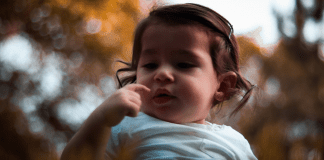 A little toddler girl (Toothbrushing Power Struggles: 3 Tips & Tricks | Dr. Bob Pediatric Dentist Lynda Lantz Contributor Miami Mom Collective)