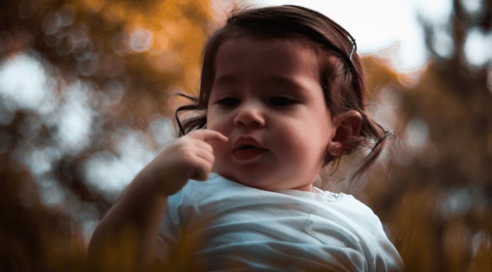 A little toddler girl (Toothbrushing Power Struggles: 3 Tips & Tricks | Dr. Bob Pediatric Dentist Lynda Lantz Contributor Miami Mom Collective)