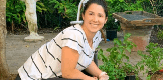 Aymee in her garden (Florida Garden: Start Yours During National Gardening Month Aymee Blanco Contributor Miami Mom Collective)