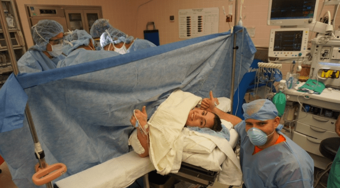 C-Section Recovery: Taking Care of Yourself So You Can Care For Baby! A mom and dad in the OR for a C-section (C-Section Recovery: Taking Care of Yourself So You Can Care For Baby! Alexa Gonzalez Contributor Miami Mom Collective)