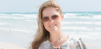 Dina enjoying the beach (Miami Mom Collective Welcomes MIA Mom Dina Garcia Contributor)