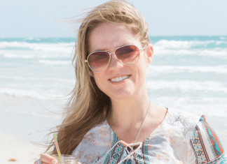 Dina enjoying the beach (Miami Mom Collective Welcomes MIA Mom Dina Garcia Contributor)