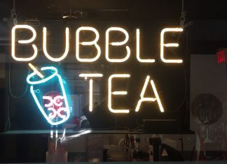 A neon sign that says bubble tea (Bubble Tea: My Epic Quest for the Perfect Boba Combination Kristen Llorca Contributor Miami Mom Collective)