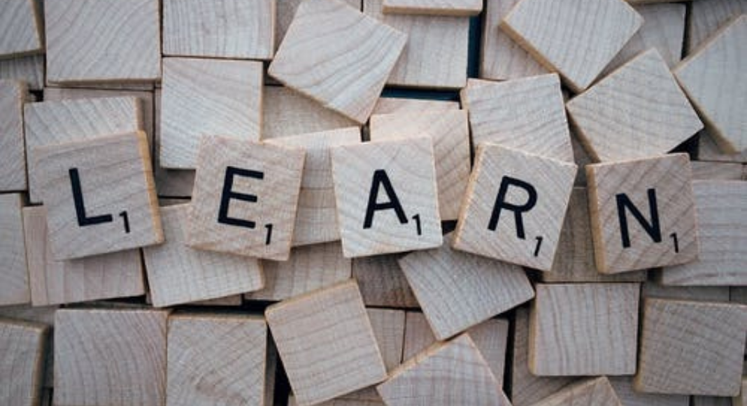 Image: Scrabble tiles spelling out "Learn" (Holly Farver Contributor Miami Mom Collective)