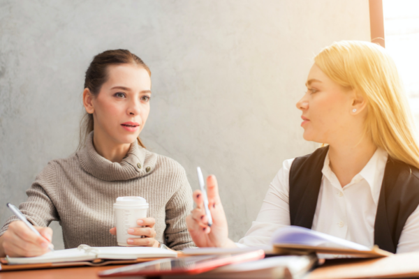 Two women talking (Autism Awareness: Involving Other Parents and Children Krystal Giraldo Contributor Miami Mom Collective)
