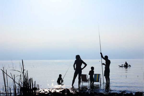 A family fishing together (Jessica Alvarez-Ducos Contributor Miami Mom Collective)