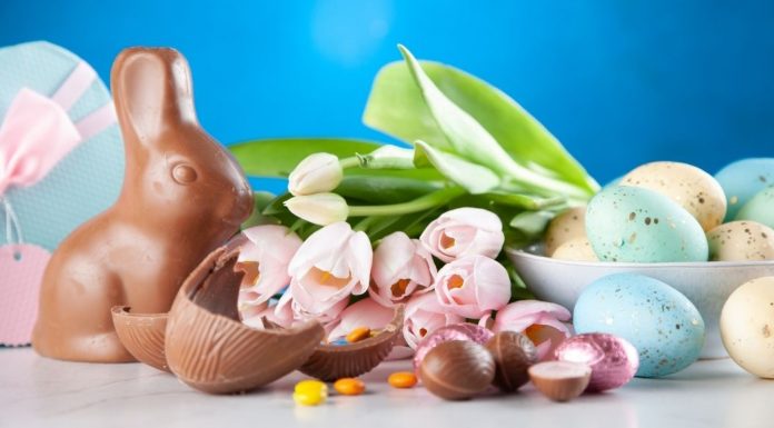 A chocolate Easter bunny with tulips and chocolate eggs (Celebrating Easter With A Creative Egg Hunt Jessica Alvarez-Ducos Contributor Miami Mom Collective)