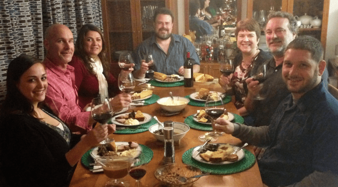 Happy St. Patrick’s Day: My Husband’s 3 Day Corned Beef Brisket Alisa and her family enjoying a meal on St. Patrick's Day (Happy St. Patrick's Day: My Husband's 3 Day Corned Beef Brisket Alisa Britton Contributor Miami Mom Collective)