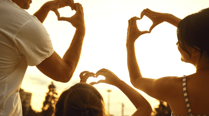 Love Where You Live: Why I Love Living in Hialeah A family making hearts with their hands (Love Where You Live: Why I Love Living in Hialeah Lorena Lougedo Contributor Miami Mom Collective)