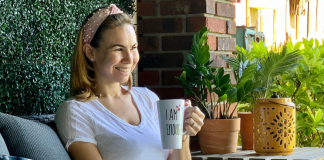 Jessica sitting with a cup of coffee (Miami Mom Collective Welcomes MIA Mom Jessica Socarras Contributor)