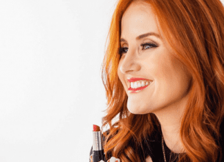 Dacia putting on some bright red lipstick (Momma Self-Care: People Love You the Way You Love Yourself Dacia Wiegandt Contributor Miami Mom Collective)