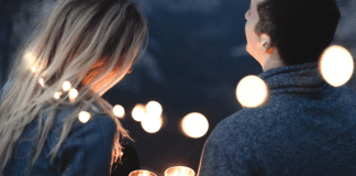 A couple sitting together (Dating Your Spouse: It's the Best Investment You'll Ever Make Rachel Hulsund Contributor Miami Mom Collective)