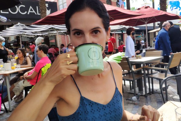 Kristen with a cup of tea (Like Throwing Caffeine on an Anxiety Fire Kristen Llorca Contributor Miami Mom Collective)