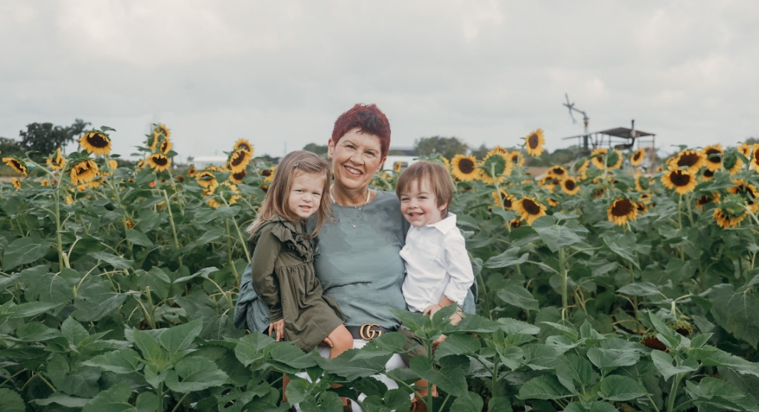 Photo of Holly with her grandkids (Miami Mom Collective Welcomes MIA Mom Holly Farver Contributor)