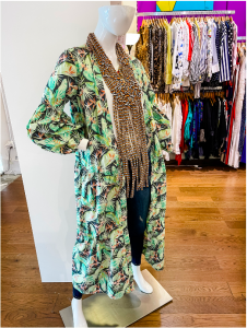 A mannequin displaying a duster and necklace (Meredith Kallaher Contributor Miami Mom Collective)
