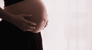 A pregnant woman's belly (Pregnancy Nutrition: Your 1st Trimester Will Make You Question Everything Monica Moreno Contributor Miami Mom Collective)