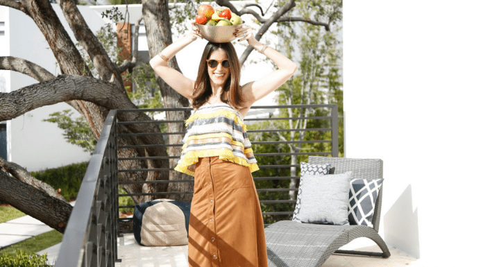 Monica with a fruit basket (Miami Mom Collective Welcomes MIA Mom Monica Auslander Moreno Contributor)