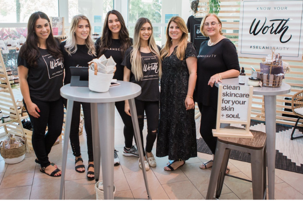 Friends and business parties having fun at a Miami Mom Collective event (Galentine's Day: What It Is and How to Celebrate It Minnie Roca Contributor Miami Mom Collective)