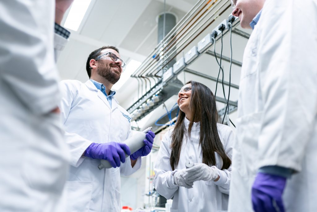 A team of scientists working together (International Day of Women and Girls in Science Zoe Costa Contributor Miami Mom Collective)