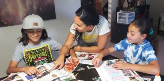 Illiett working on vision boards with her kids