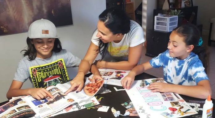 Illiett working on vision boards with her kids