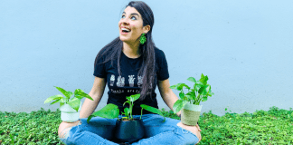 Image: Ana-Sofia holding a few species of pothos plants