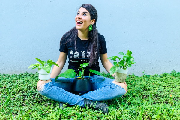Image: Ana-Sofia with a few pothos plants