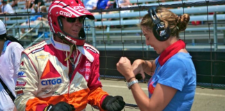 Image: Sandra works with a driver at the Indy500 in 2012
