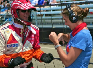 Image: Sandra works with a driver at the Indy500 in 2012
