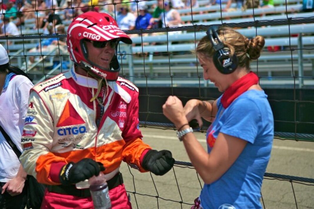 Image: Sandra working with a driver at the Indy500 in 2012