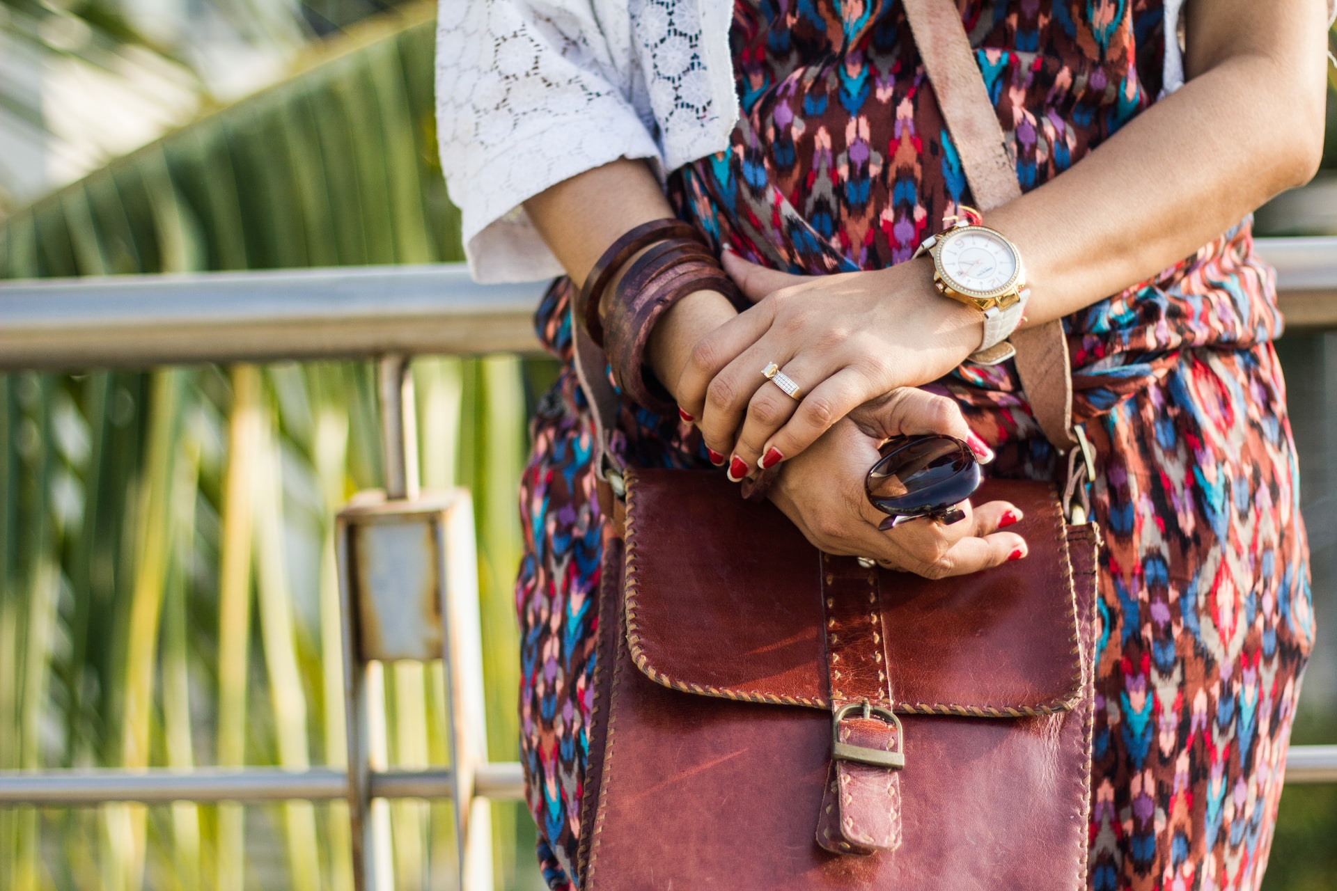 Image: A woman stands with her keys in hand
