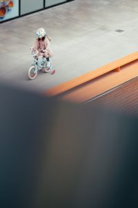 little girl riding a bike 3 Things We Did in Miami While Practicing Social Distancing Janeris Marte Contributor Miami Moms Blog