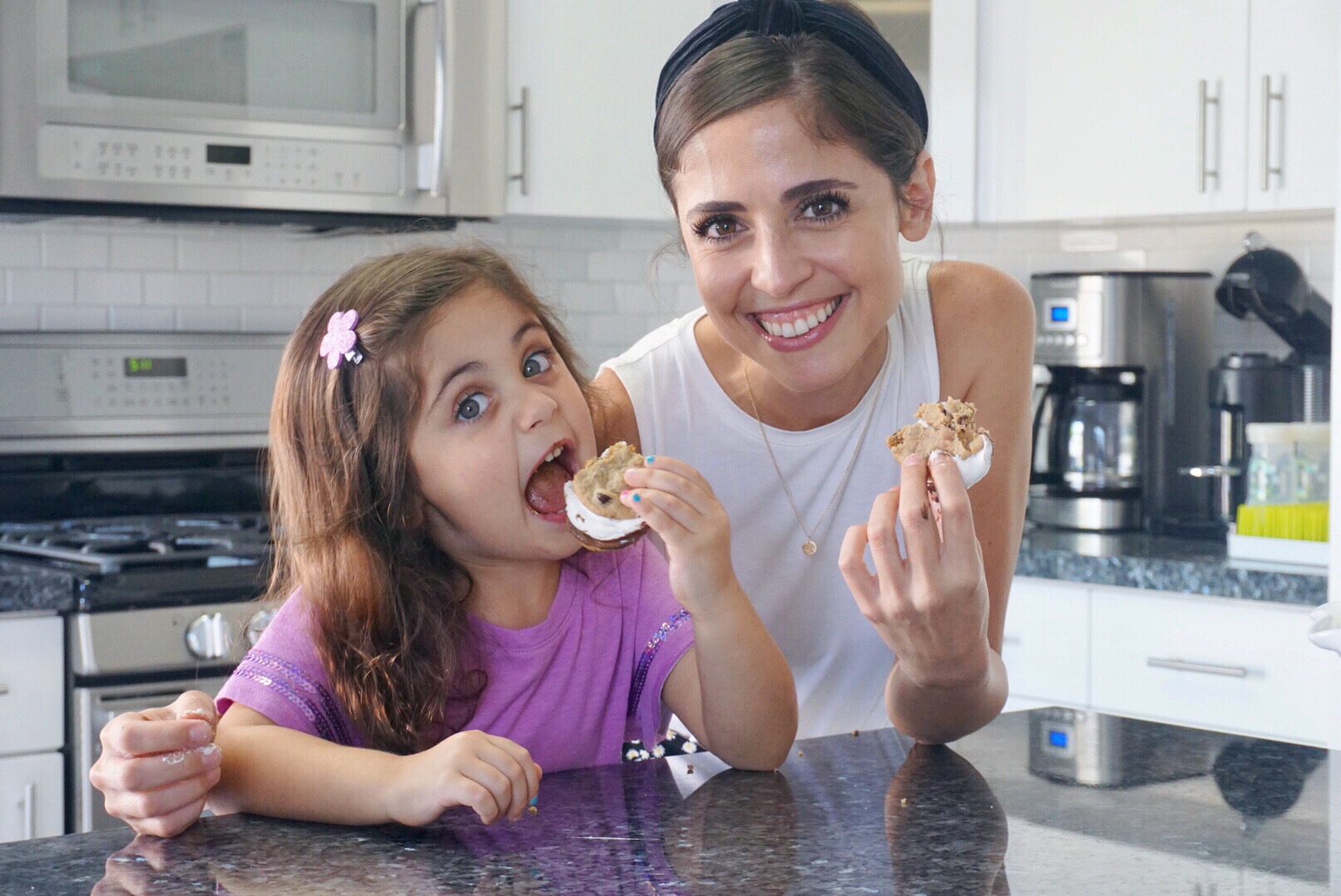 Image: A mom and her daughter smile for the camera with their homemade summer treats