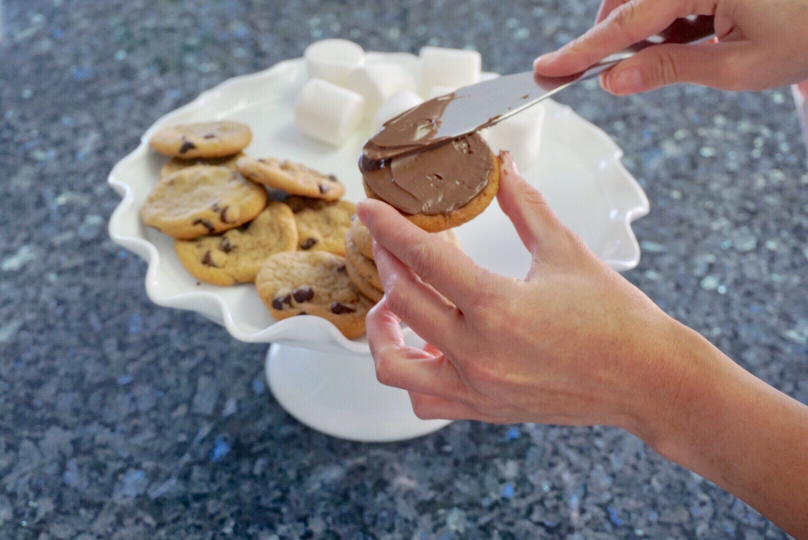 Image: Slathering Nutella on a chocolate chip cookie