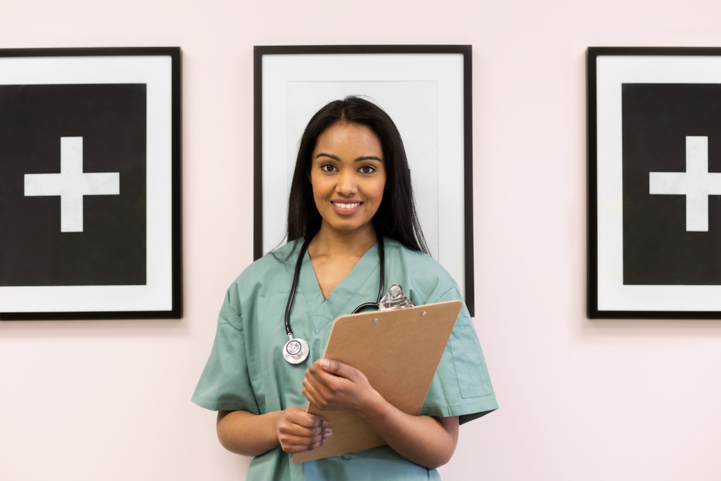 Image: A doctor holding a clipboard