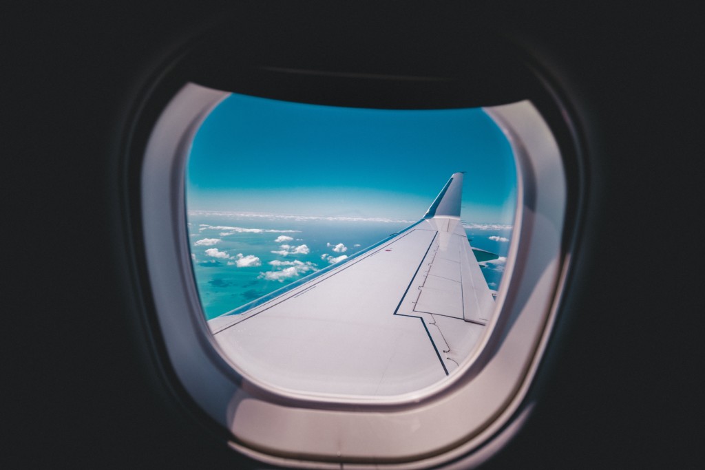 Traveling With Kids: Tips From One Mom to Another airplane window Traveling with Kids: Tips from One Mom to Another Vanessa Santamaria Contributor Miami Moms Blog
