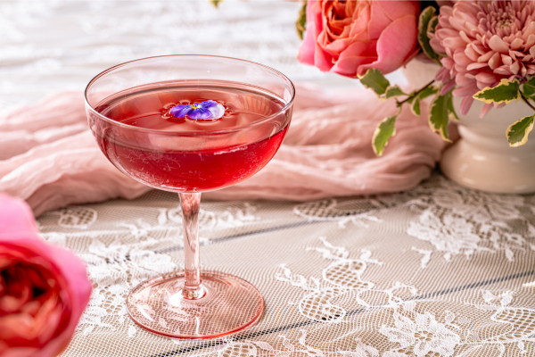Pink brunch cocktail on decorated table