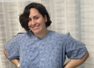 Image: A woman with a hospital gown waiting to have a port placed